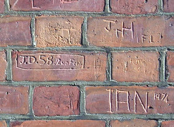 Initials on brick, Wilton Rise, York, old chapel building