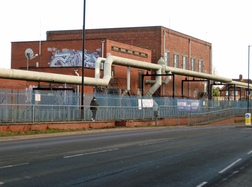 Brick building and large gas pipes