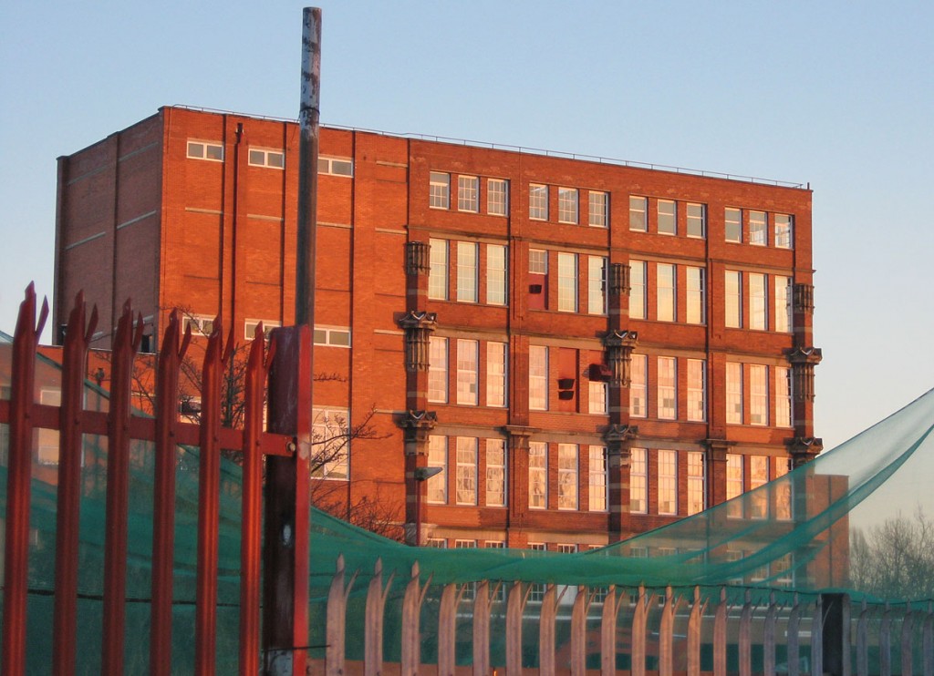 Brick factory building in late afternoon sun