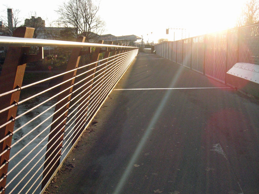 Bridge deck and railing in sunlight