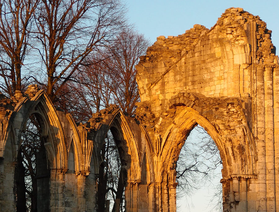 Medieval ruin in golden winter afternoon sunlight