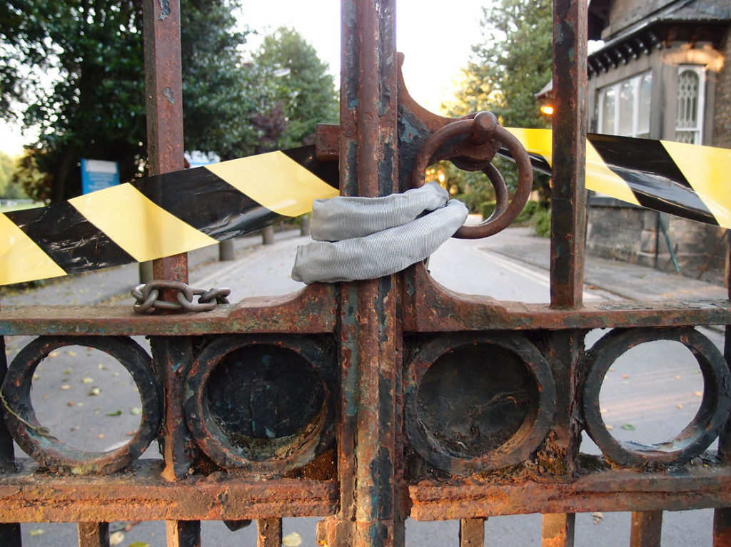 The closed and rusty gates of Bootham Park. Not sure if this is intended as celebratory decoration