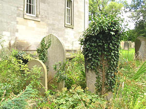 Headstones in the area behind the chapel
