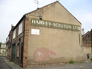Harvey-Scruton Ltd, on a wall on Barker Lane