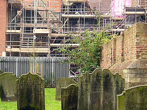 View of building work, from Holy Trinity churchyard